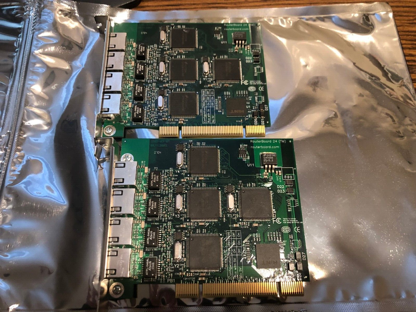 Lot of 2 Mikrotik RouterBoard 24  Four independent Ethernet Port Cards