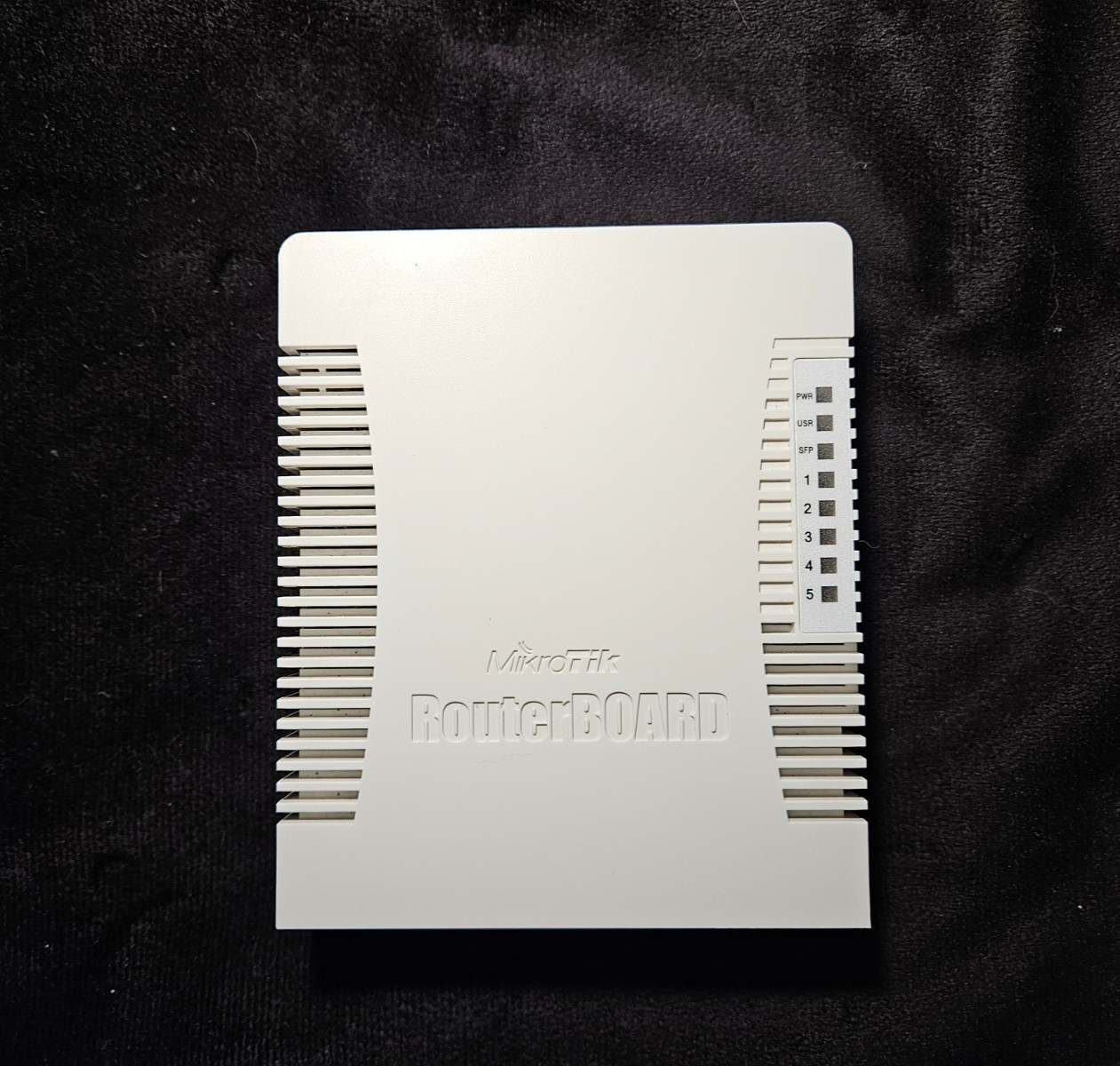 MikroTik RB960PGS hEX PoE 800MHz 128MB 5xGb SFP L4 – Used