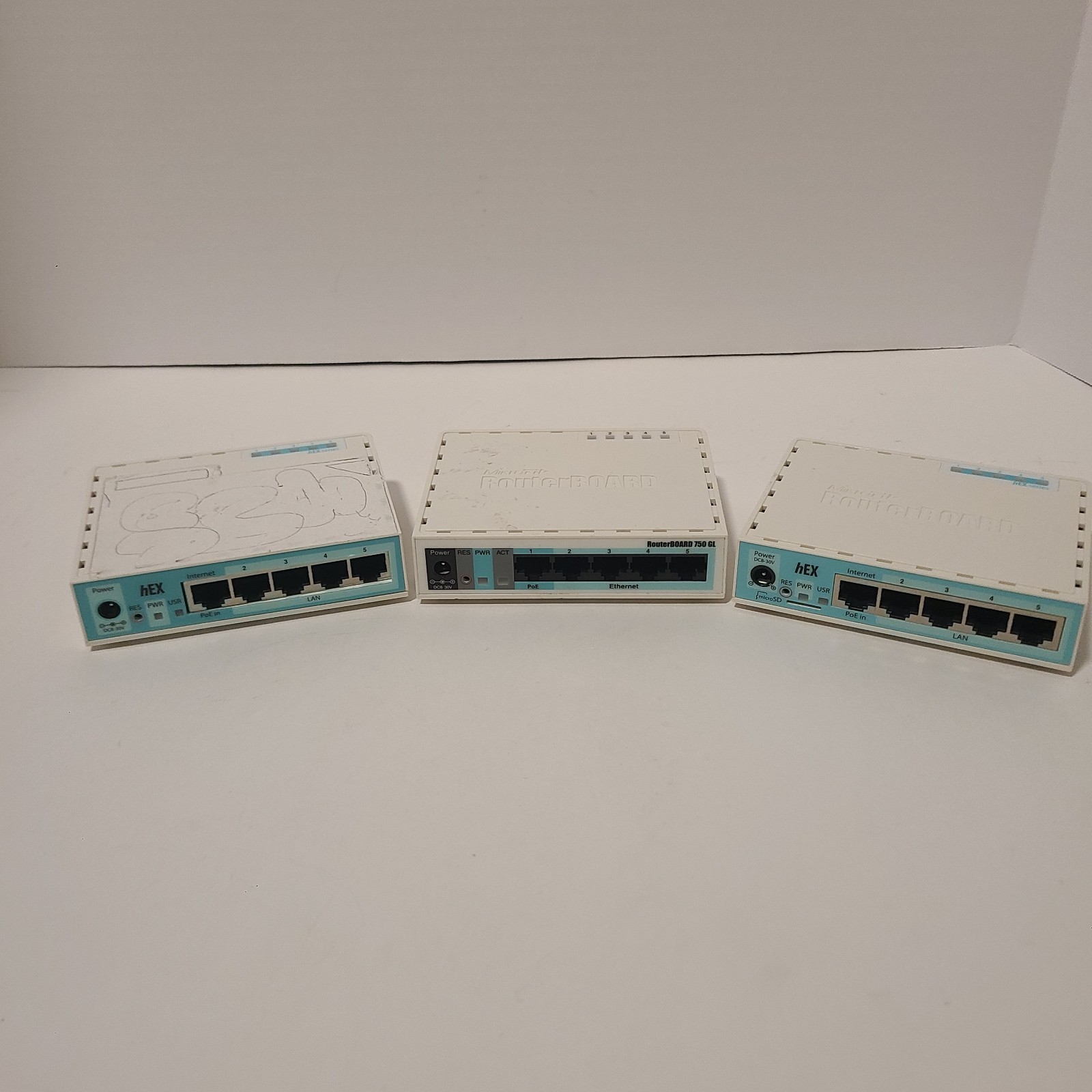 (LOT OF 3) MikroTik Routerboard 750GL & 750GR2 & 750GR3 – NO POWER SUPPLY